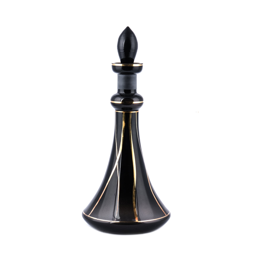 A Rare Black Decanter With Four Liqueur Glasses.